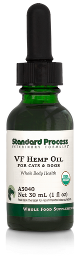 Image of a bottle of liquid VF Hemp Oil from Standard Process Veterinary Formulas next to a dropper that is included with the bottle.